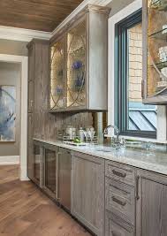 Golden oak ready to assemble (rta) kitchen cabinets bring out the brightest colors in your kitchen. Gray Stained Red Oak Cabinetry Glass Front Cabinets Wet Bar Fuchsia Design Staining Cabinets Oak Kitchen Cabinets Oak Kitchen