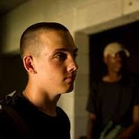 A U.S. Army 173rd Airborne Brigade jumpmaster rests