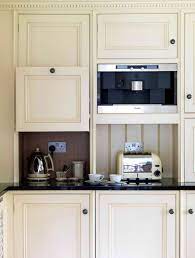 Pin By L Thibeaultassoc On Storage Hidden Kitchen White Kitchen Appliances Apartment Decorating For Couples