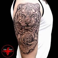 When you're ready to commit to a larger piece, going for a rose arm tattoo adds drama and beauty to the canvas of your skin. Top 61 Best Tiger Rose Tattoo Ideas 2021 Inspiration Guide