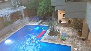 This small sunken pool is built into the deck and raised above ground level. Very Small But Very Deep Pool Not Suitable For Children Picture Of Apollonia Hotel Apartments Athens Tripadvisor