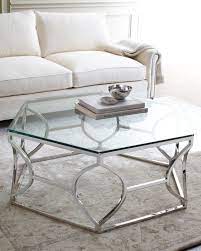 A tiered coffee table is a type of living room coffee table that can provide you with two surfaces and storage. 30 Glass Coffee Tables That Bring Transparency To Your Living Room