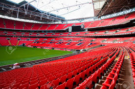 ﻿ «wembley stadium» (hereinafter «wembley stadium» associated with the ee for sponsorship reasons) — a football stadium in wembley, london. Feb 24 2011 London Uk Red Seat And Interior Of Wembley Football Stock Photo Picture And Royalty Free Image Image 103202697