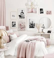 For a black and white bedroom, this space feels surprisingly vibrant and glamorous. Elegant Gallery Wall Pink White Bedroom Black And White Posters Golden Frames Gallery Wall Inspiration Posterstore Eu