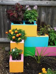 Check out this colorful concrete block planter from modernly wed Cinder Block Planters Unique Diy Ideas Balcony Decoration Eco Friendly Garden Ideas
