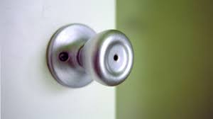 Once you've bent the paper clip into your makeshift picking device, grip the handle and insert the other end into the lock. How To Pick The Lock Of An Interior Door