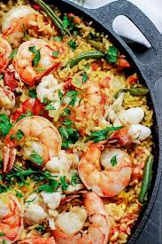 Easy Seafood Paella Recipe The Mediterranean Dish Paella Recipe Seafood Seafood Paella Easy Seafood