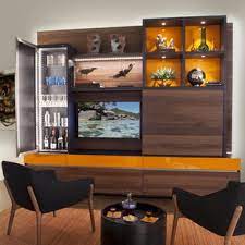 The large living room combines very different colors and patterns with natural wood and stone details for a look that's at once both rustic and another good way to accommodate a larger entertainment center in a smaller space? Living Room Entertainment Houzz