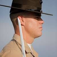 General Zinni, Commanding General Marine Corps Base Quantico, Virginia,  addresses the crowd and his troops at his retirement ceremony