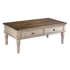 Old world table chai coffee table, rustic tones hand crafted door, flat top, carved sides accent vintage tables. Southbury Rectangular Coffee Table La Z Boy