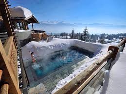 Norway Soak In Hot Springs Amongst Snow Sleep In Ice Hotel Glass Igloo Lavvu And See The Northern Lights Crans Montana Hot Pools Beautiful Places