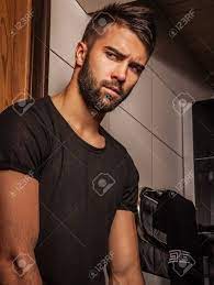 Attractive Men Indoor Close-Up Photo Stock Photo, Picture And Royalty Free  Image. Image 30973381.