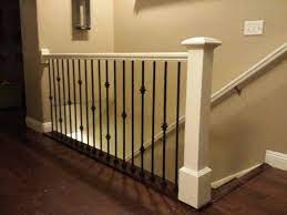 I really like the idea of black… i hadn't considered it, but can see that it will make things less busy. Antique White Railing And Post With Black Iron Balusters That We Built In A Home In Salt Lake City Indoor Railing Staircase Design Iron Balusters