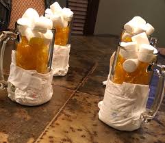 Simple Inexpensive Decorations For A Huggies For Chuggies Party Beer Mug Butterscotch Candies Marshmall Beer Baby Shower Brew Baby Shower Daddy Baby Shower