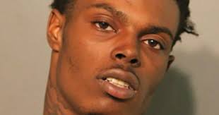 Two men charged in fatal Chicago shopping district shooting