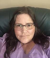 What hairstyle would make thin hair look thicker and healthier for women  over 50?