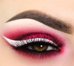 Black And White Winged Eyeliner Beautiful Holiday Themed Red Glitter Smokey Eye With White Winged Liner And Smudged Lower Lash Line Perfect Look For Christma Eye Makeup Makeup White Eyeliner