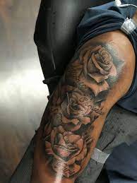 These tattoos depict will power, strength, love, and how you can rise even in the darkest times. Roses Half Sleeve Tattoo Half Sleeve Rose Tattoo Dark Skin Tattoo Tattoo Sleeve Men