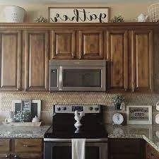 48 Inspiring Cottage Kitchen Cabinets Ideas With Country Style Above Kitchen Cabinets Decorating Above Kitchen Cabinets Top Of Kitchen Cabinets Decor