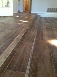 Photo Of All Flooring Install Richardson Tx United States Wood Look Porcelain Tile Long Steps Wood Tile Floors Wood Look Tile Floor Ceramic Wood Floors