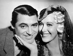 Cary Grant and Grace Moore in a publicity photo for "When You're in Love"  (1937)