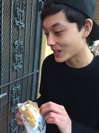 Sharing a funny one day, Riley with his slicked back hair and a cat