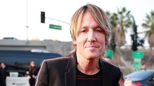 His father, who owned a convenience store, put an ad for a guitar teacher in his shop window. Keith Urban Promiflash De