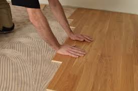 Adhesive is used to secure new flooring to the subfloor. How To Install Engineered Hardwood Flooring On Concrete Twenty Oak