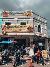 The original and famous local delicacy, a must try dessert cake with palm sugar glaze. Melaka Daily Kuih Keria Antarabangsa Haji Jalil Facebook