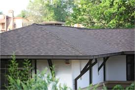 Asian red fish scale asphalt roof shingle. Cambridge Xpress Iko