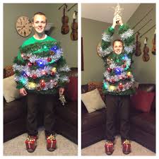 Crayon pop dress up as christmas trees for their upcoming. My Very Own Diy Christmas Tree Costume Complete With Presents Under The Tree And Lights Christmas Tree Costume Diy Christmas Tree Tacky Christmas