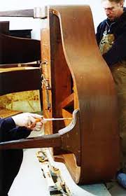 Remove the center leg (with the pedals) and its supports and set it aside. How To Move A Baby Grand Piano