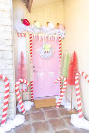 Decorate Your Door As A Gingerbread House In 2020 Gingerbread Christmas Decor Christmas Door Decorations Candy Christmas Decorations