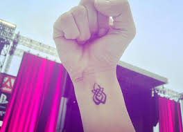 She chose to get the heartbeat tattoo to represent left and a and semi colon for where a sentence could end, but didn't. Sexual Assault Survivors Uniting By Getting Lady Gaga S Fire Rose Unity Survivor Tattoo Metro News