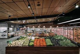 A Modified Italian Apeliono Features In The Entry Of The Store Which Is Used For Visual Merchandising And Supermarket Design Grocery Store Design Summer Hill