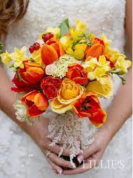 We handpick each flower bouquet and source only the highest quality silk flowers so you. Brilliant Yellow And Orange Bridal Bouquet Lillie S Flower Journal Beautiful Wedding Bouquets Ora Wedding Cake Red Red Bouquet Wedding Fall Wedding Colors