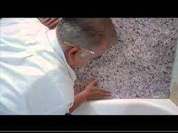 A decorative tile accent row tops the installation. St Paul Bathtub Surround Installation Drywall Youtube