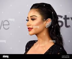 Shay Mitchell arrives at the InStyle and Warner Bros. Golden Globes  afterparty at the Beverly Hilton Hotel
