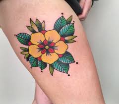 My Fourth Tattoo I Ve Always Been In Love With The American Traditional Style So I Was Bey Traditional Tattoo Flowers Yellow Flower Tattoos Traditional Tattoo