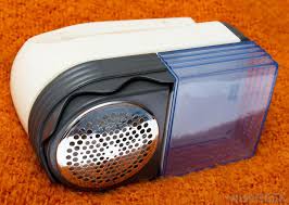 Removing clothing pilling with a shaver. What Causes Fabric Pilling With Pictures