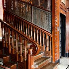 Even though you'll likely be traipsing down the stairs in your favorite pair of pajamas while holding your morning coffee, we still think that this glam design from yesteryear has a place in today's homes. Art Deco Mumbai En Twitter Image 2 Metal Grilles Appear To Cascade Down The Wooden Balustrade At Roxana Churchgate Image 3 The Lift At Suleman Chambers Colaba Is Caged In A Teak