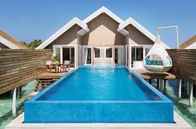 Temptation Pool Villa A Spacious Wooden Deck Terrace Boasts A Dining Area And A Cabana Overlooking Nothing L Maldives Hotel Amazing Swimming Pools Water Villa