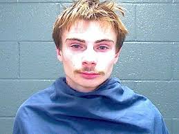 Police arrests suspect accused of robbing an elderly business woman