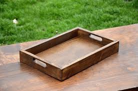 Featuring removable/reversible wood tray that can be used as a flat surface or as serving tray. Wood Tray Serving Tray Coffee Table Ottoman Tray Penn Rustics