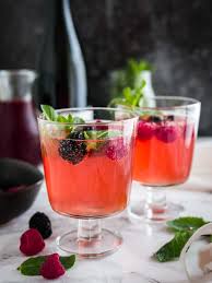 It's much better to mix things up and pull together a champagne cocktail, and we've got a whole range of delicious and simple recipes that will dazzle any guests you might entertain this year. Sparkling Berry Champagne Cocktail Plated Cravings
