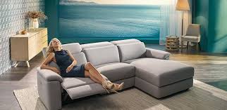 fabric range featuring electric recliner with soft touch