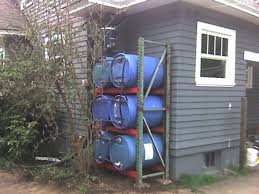 This offers the dual benefit of. Stacked Rain Barrels Water Barrel Rain Barrel Rain Barrel System