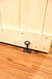 A Floor Guide From Home Depot Keeps The Bottom Of The Door In Place The Rubber Circular Section At The Top Gently Keeps The Door From Banging Around My Blog