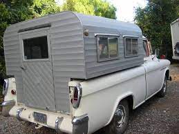 Custom Camper Shell From Craigslist Not Pictured Is That Inside The Loft Bed Is Right Below The Windows You Camper Shells Truck Camper Truck Camper Shells