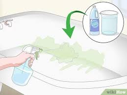 Nonabrasive supplies can be used for cleaning bathtub grout or mold and wiping away stains from tub fixtures. 3 Ways To Clean An Enamel Bathtub Wikihow